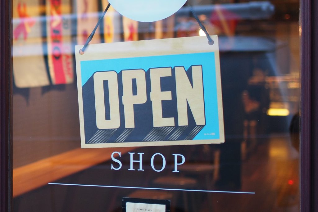 An open sign on a store door